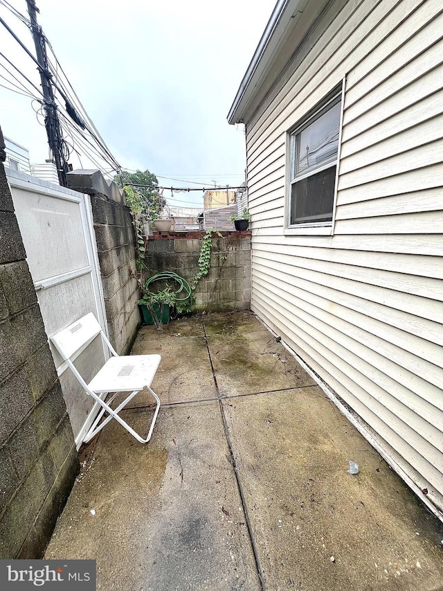 view of patio / terrace with fence