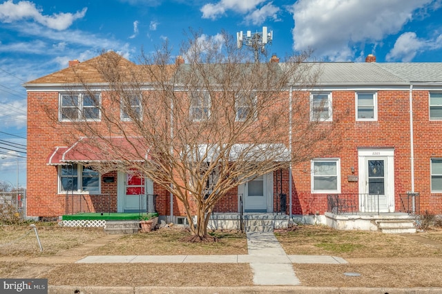 multi unit property with brick siding