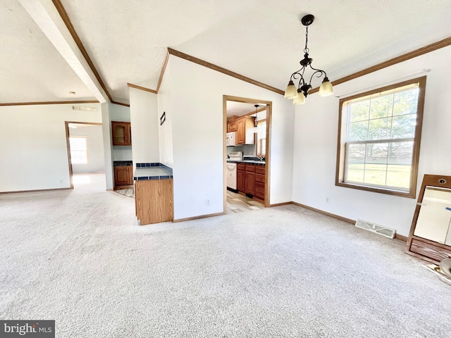 unfurnished living room with light carpet, visible vents, lofted ceiling with beams, and an inviting chandelier