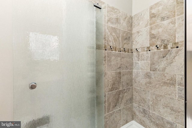 bathroom with a stall shower