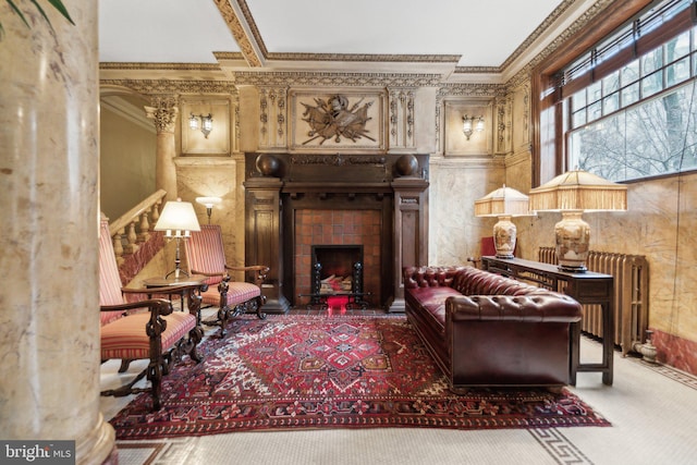 sitting room with radiator heating unit, a fireplace with flush hearth, stairway, carpet, and crown molding