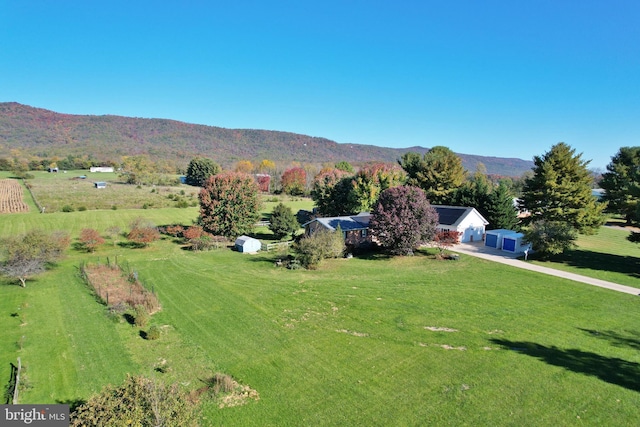 aerial view featuring a mountain view and a rural view