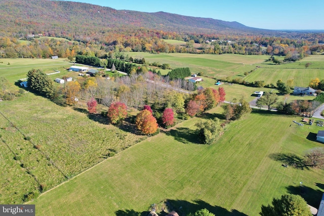 drone / aerial view featuring a rural view and a mountain view