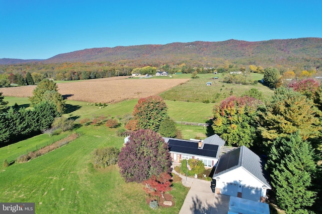 birds eye view of property with a rural view and a mountain view