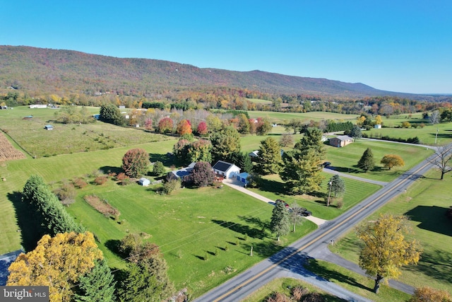 bird's eye view featuring a rural view and a mountain view