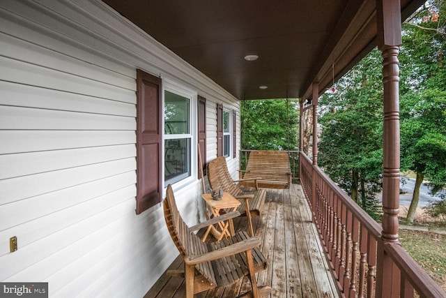 deck featuring covered porch