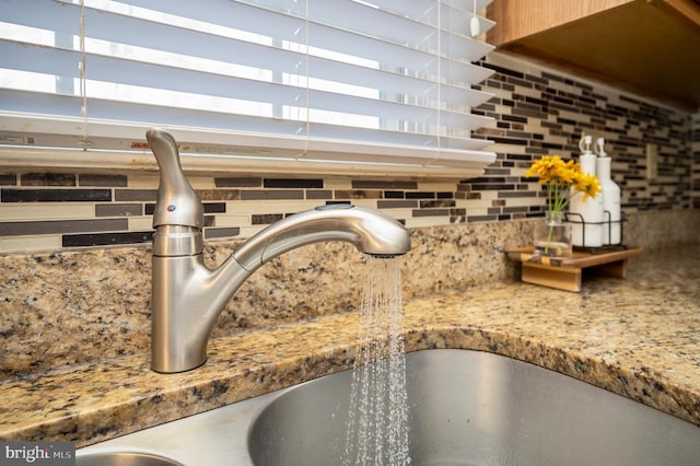 room details with a sink and backsplash