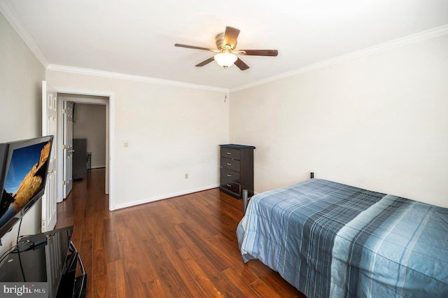 bedroom featuring a ceiling fan, baseboards, ornamental molding, and wood finished floors