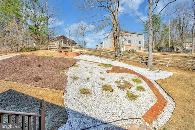 view of yard featuring fence