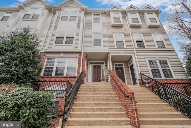 multi unit property featuring brick siding