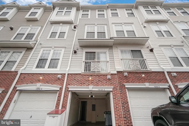 view of building exterior with an attached garage