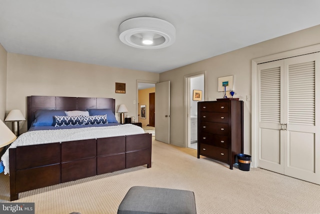 bedroom featuring light colored carpet