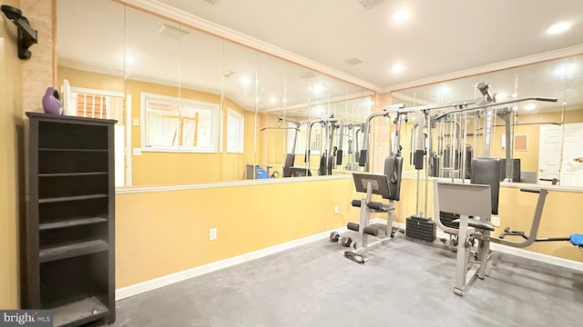 workout room with baseboards, ornamental molding, visible vents, and recessed lighting