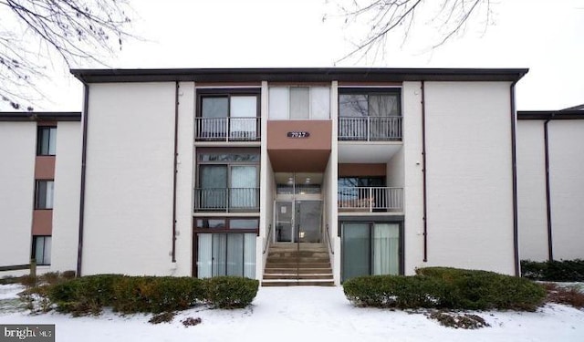 view of snow covered building