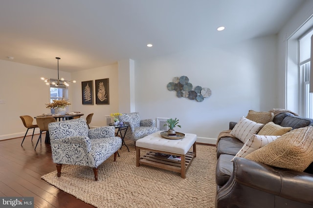 30 N Marshall St, Lancaster, PA 17602 - living room with a wealth of natural light, hardwood / wood-style flooring, baseboards, recessed lighting, and an inviting chandelier