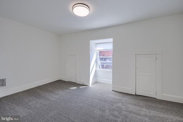 30 N Marshall St, Lancaster, PA 17602 - unfurnished room featuring baseboards, visible vents, and dark carpet
