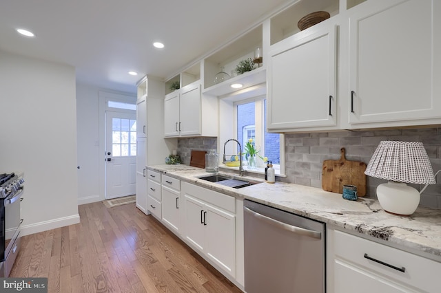 30 N Marshall St, Lancaster, PA 17602 - kitchen with a sink, stainless steel appliances, plenty of natural light, and light wood finished floors