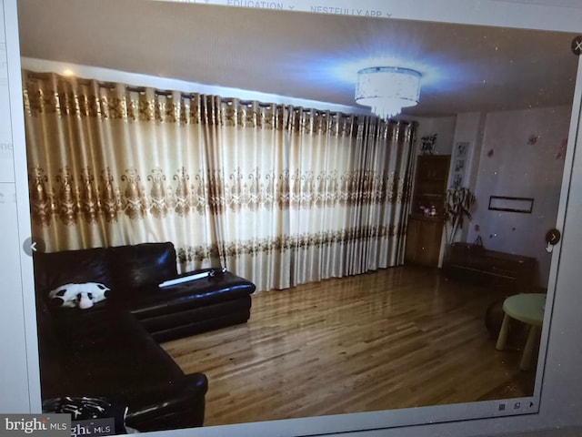 living area with wood finished floors