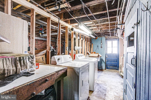 below grade area with independent washer and dryer and a sink