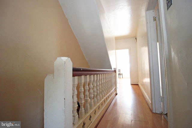 hall featuring wood finished floors