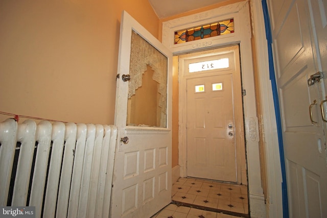 foyer entrance with radiator heating unit