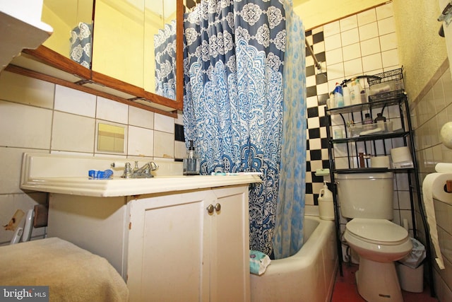 full bathroom with toilet, vanity, tile walls, backsplash, and shower / bath combination with curtain