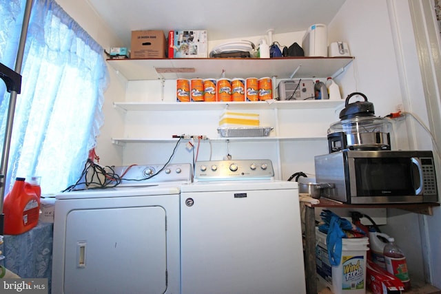 laundry room featuring laundry area and washer and clothes dryer