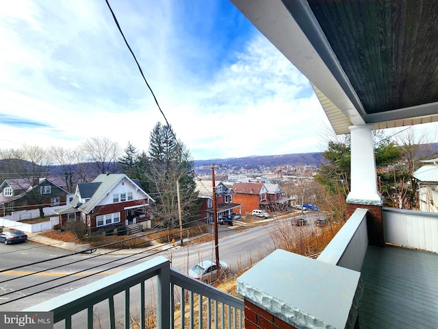 balcony featuring a residential view