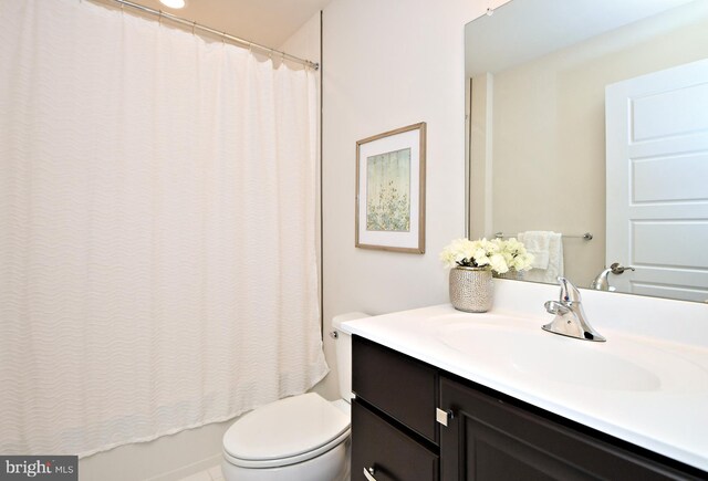 full bath featuring toilet, vanity, and shower / bathtub combination with curtain