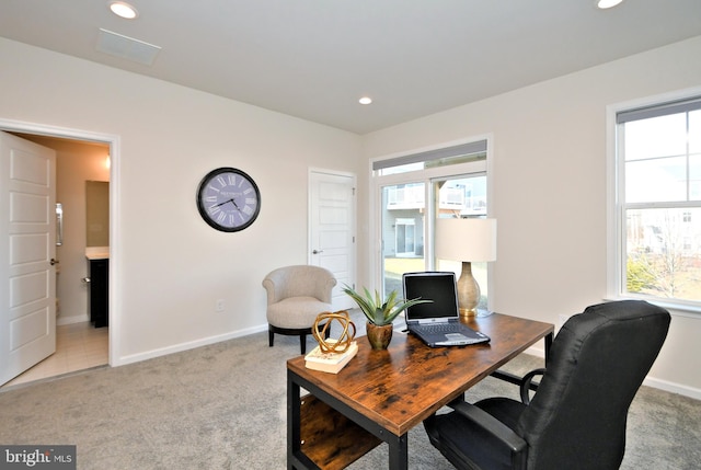 home office with recessed lighting, baseboards, and light colored carpet