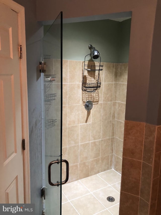 bathroom featuring a stall shower