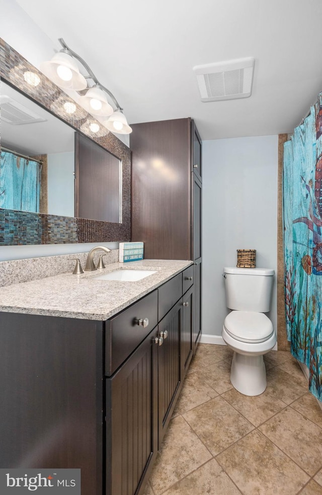 full bath with toilet, tile patterned flooring, vanity, and visible vents