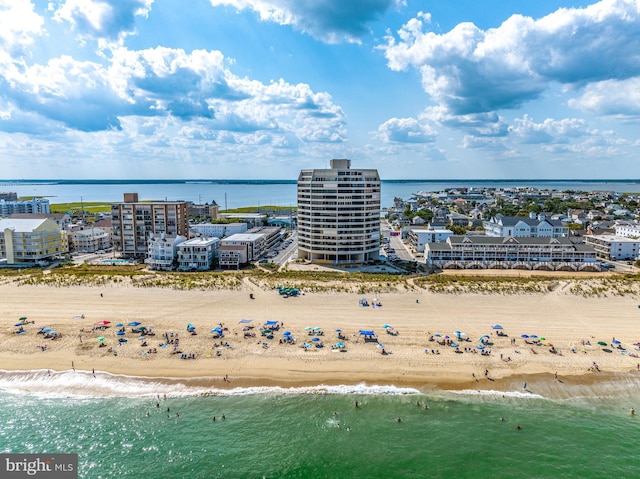 aerial view featuring a water view and a view of the beach