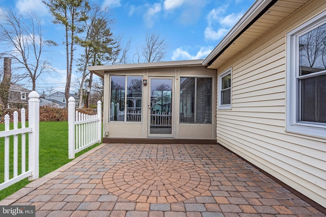 view of patio / terrace featuring fence