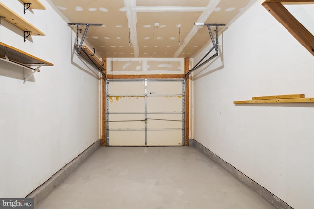 garage featuring baseboards