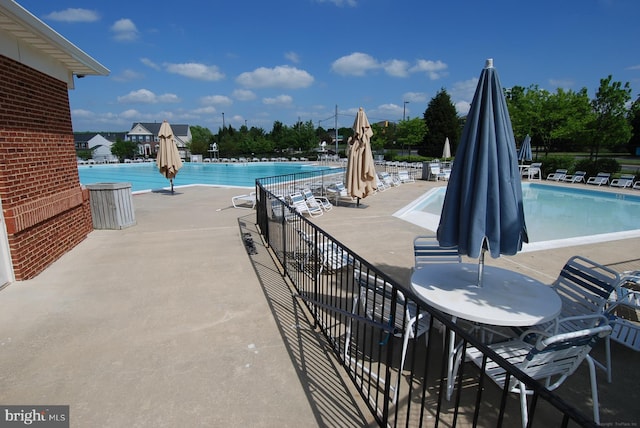 pool with a patio