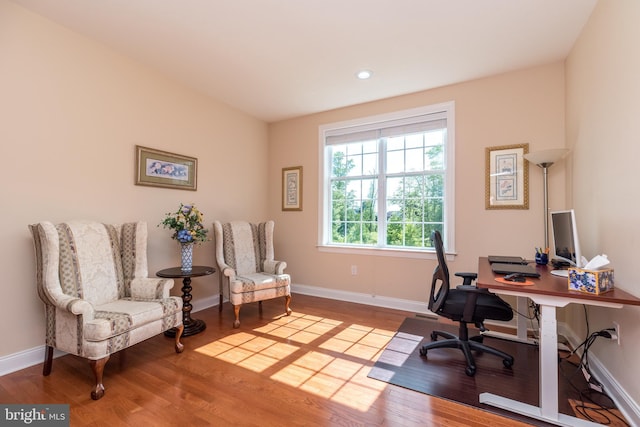 office with recessed lighting, wood finished floors, and baseboards