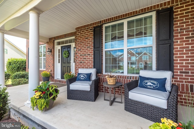 view of patio featuring a porch