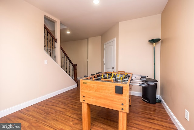 game room with recessed lighting, wood finished floors, and baseboards