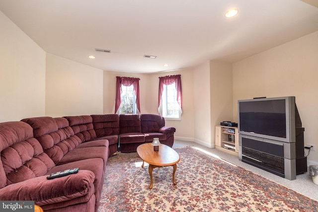 living area with visible vents, recessed lighting, carpet, and baseboards