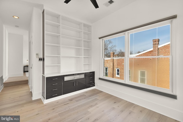 interior space featuring light wood finished floors, recessed lighting, visible vents, and baseboards