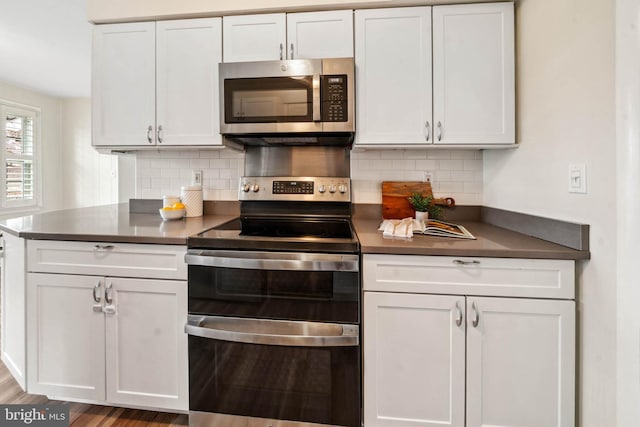 kitchen featuring white cabinets and stainless steel appliances