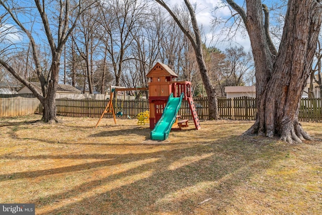 view of jungle gym with a fenced backyard and a yard