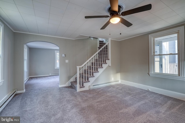 empty room with ornamental molding, a baseboard radiator, a baseboard heating unit, and stairway