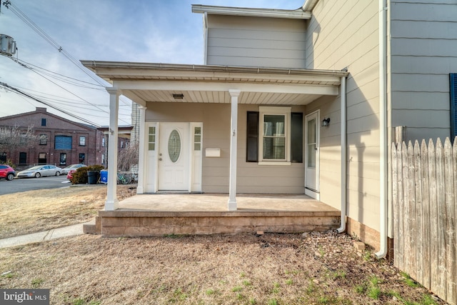 doorway to property featuring a porch