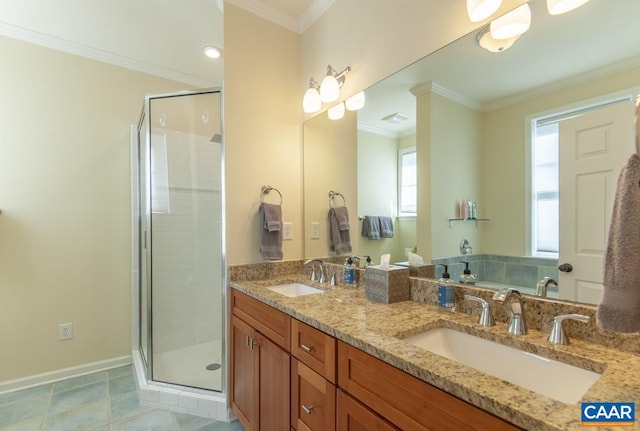 bathroom with a shower stall, ornamental molding, and a sink