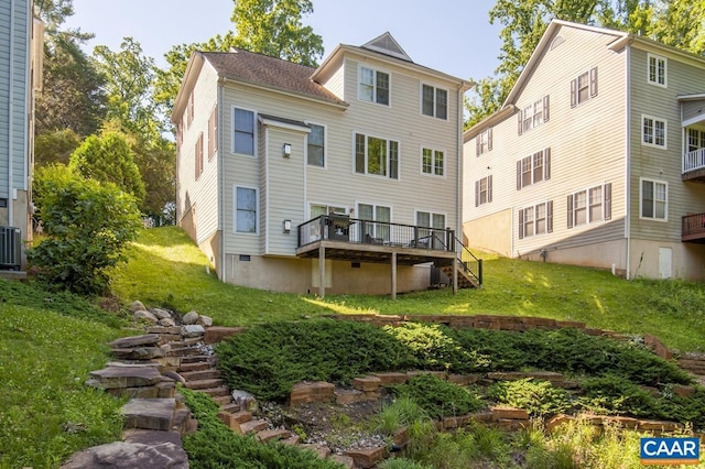 rear view of property featuring stairs, a yard, a deck, and central air condition unit