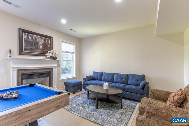 living area featuring pool table, a glass covered fireplace, visible vents, and recessed lighting