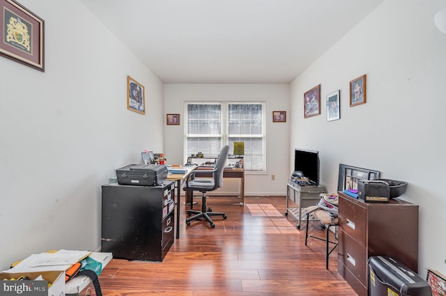 office with baseboards and wood finished floors