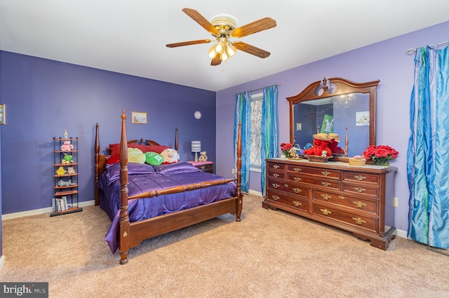 bedroom with baseboards, light colored carpet, and a ceiling fan